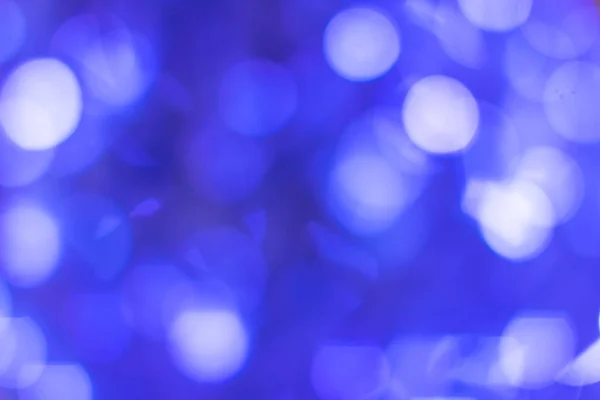 Blue bokeh ha sfocato le luci sfocate. Sfondo astratto — Foto Stock