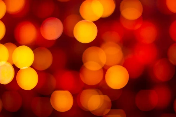Sfondo astratto rosso e giallo con luci sfocate bokeh — Foto Stock