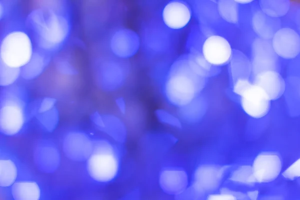 Blue bokeh ha sfocato le luci sfocate. Sfondo astratto — Foto Stock