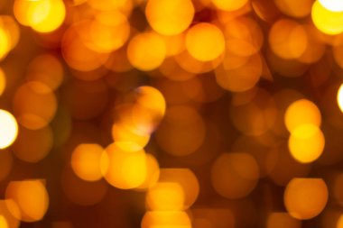 Turuncu bokeh bulanık ışıkları söndürdü. Soyut arkaplan