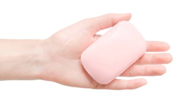 İnsan elinde sabun. Beyaz arka planda izole edilmiş hijyen ürünü (virüsün korunması)