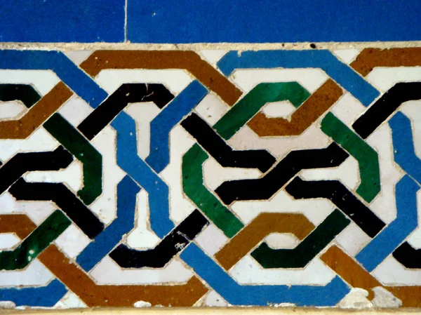 Geometric pattern in La Alhambra, Spain. Arab influence