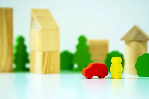 Insurance or business concept. Wooden persons and cars — 스톡 사진