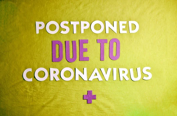 Phrase Postponed Due Coronavirus Paper Letters — Stock Photo, Image