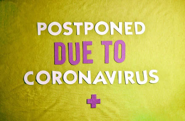 Phrase Postponed Due Coronavirus Paper Letters 스톡 사진