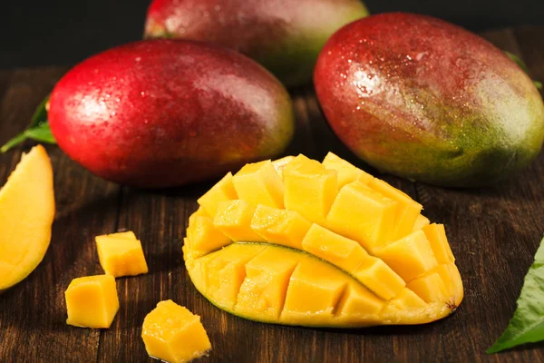 Some mango on wood boards. — Stock Photo, Image