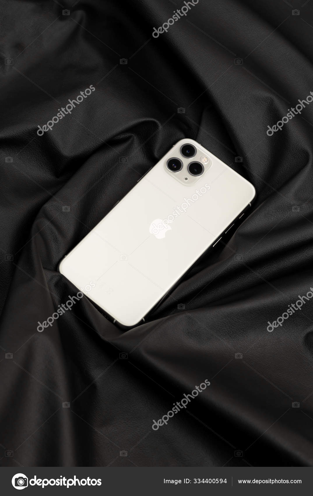Apple Iphone 11 Pro Silver Color On A Black Leather Surface Stock Editorial Photo C Seremin