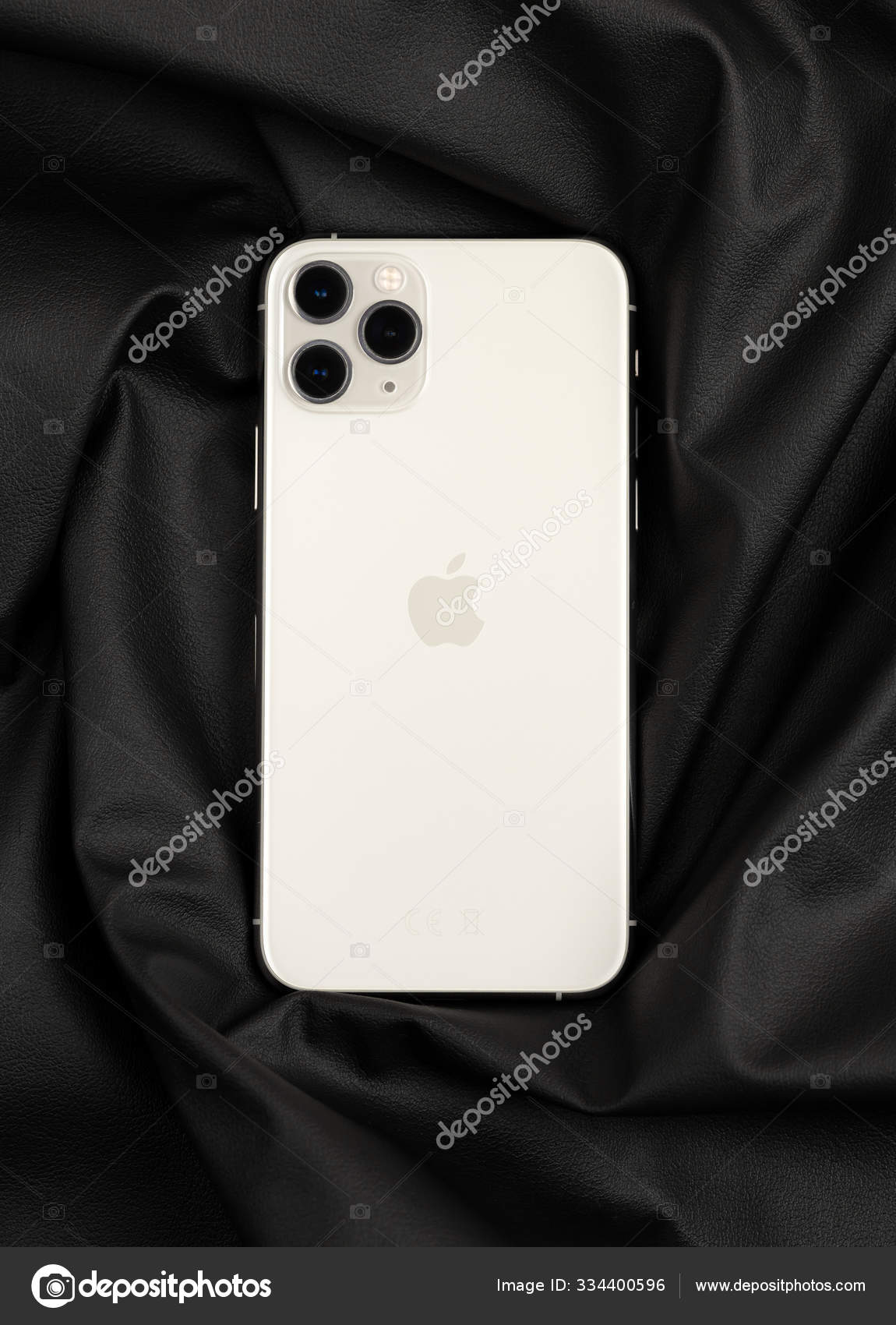Apple Iphone 11 Pro Silver Color On A Black Leather Surface Stock Editorial Photo C Seremin