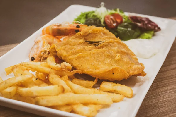 Fish and Shrimps Snapper battered and fried, served with tartar sauc