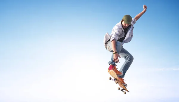 Skater on sky background