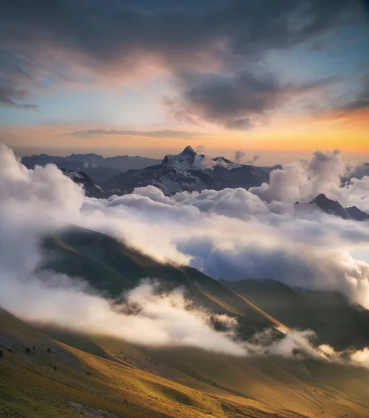 High mountain ridge in clouds — Stock Photo, Image