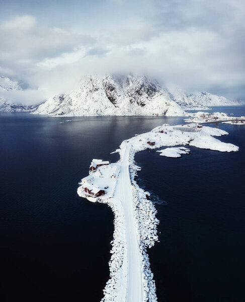 Aerial view on the Hamnoy village, Lofoten Islands, Norway. Landscape in winter time during blue hour. Mountains and water. Travel - image