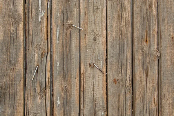 Achtergrond van oude houten planken met scheuren en spijkers — Stockfoto