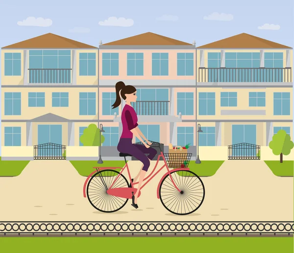 Dziewczyna jeździ rowerem do domu w jej sąsiedztwie — Wektor stockowy