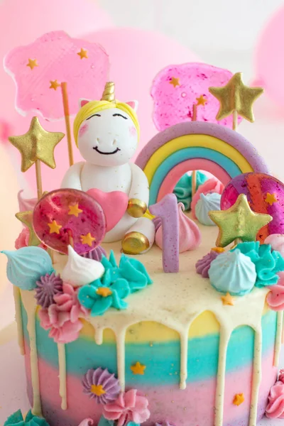 Party cake with unicorn for first birthday