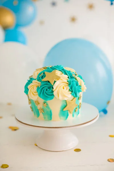 Blue smash cake with stars for boy