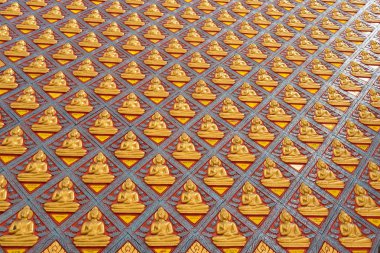 Altın buddha heykeli paterni