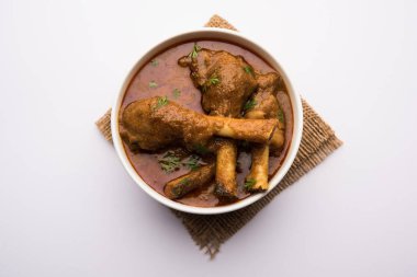 Hyderabadi Mutton Paya, Nehari, nahari veya Nihari Masala. Naan ve pirinçle servis edilir. seçici odak