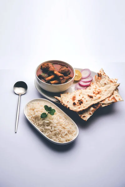 Hyderabadi Mutton Paya, Nehari, nahari or Nihari Masala. served with Naan and rice. selective focus