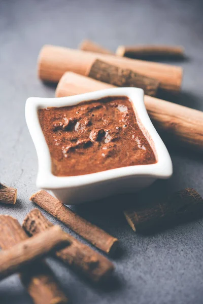 Ayurvedic Liquorice sandalwood Face Mask made using Mulethi or jeshthamadh and Chandan powder. selective focus