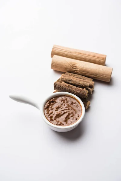 Ayurvedic Liquorice sandalwood Face Mask made using Mulethi or jeshthamadh and Chandan powder. selective focus