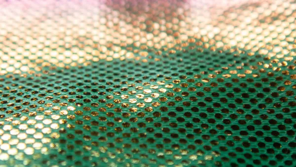 Sıradışı bir yapısı olan parlak soyut bir arkaplan. Gelecekteki ruh hali ve materyal. gökkuşağı rengi 