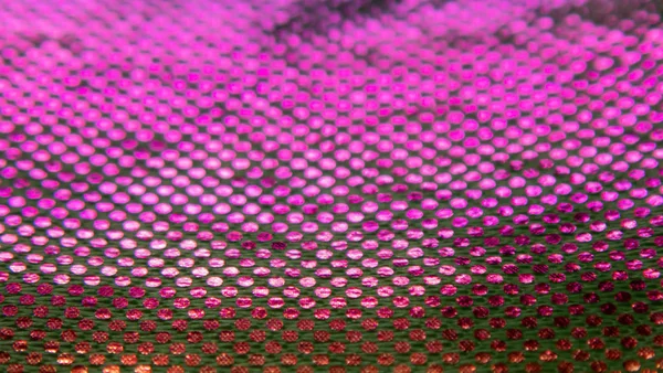 Sıradışı bir yapısı olan parlak soyut bir arkaplan. Gelecekteki ruh hali ve materyal. gökkuşağı rengi 