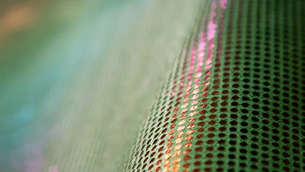 Sıradışı bir yapısı olan parlak soyut bir arkaplan. Gelecekteki ruh hali ve materyal. gökkuşağı rengi 