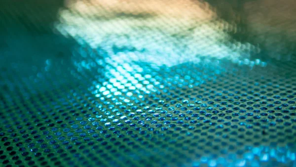 Sıradışı bir yapısı olan parlak soyut bir arkaplan. Gelecekteki ruh hali ve materyal. gökkuşağı rengi 