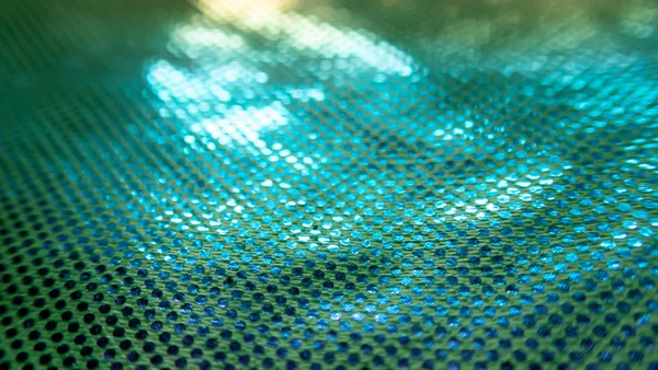 Sıradışı bir yapısı olan parlak soyut bir arkaplan. Gelecekteki ruh hali ve materyal. gökkuşağı rengi 