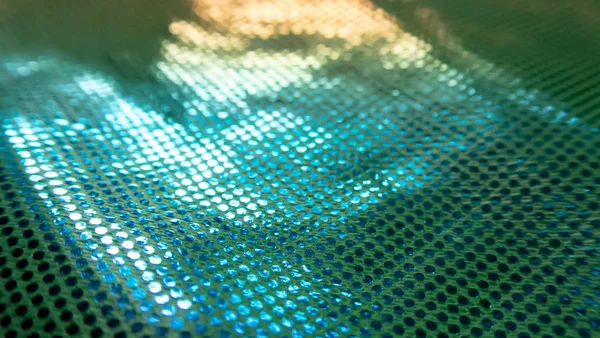 Sıradışı bir yapısı olan parlak soyut bir arkaplan. Gelecekteki ruh hali ve materyal. gökkuşağı rengi 