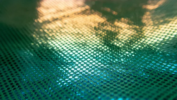 Sıradışı bir yapısı olan parlak soyut bir arkaplan. Gelecekteki ruh hali ve materyal. gökkuşağı rengi 