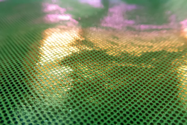 Sıradışı bir yapısı olan parlak soyut bir arkaplan. Gelecekteki ruh hali ve materyal. gökkuşağı rengi 