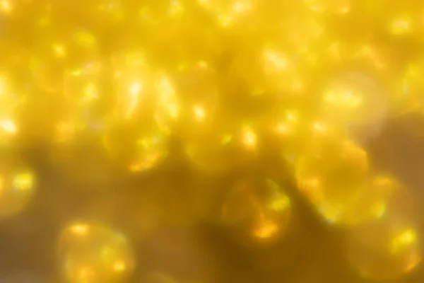 Bokeh ve parlak arkaplanlı parlak bir ışık. Dokulu yardım tuvali, lüks, yeraltı, gümüş arkaplan. 