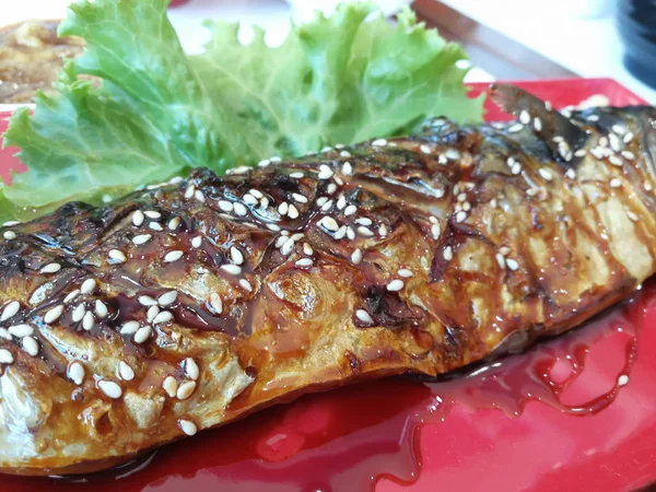 Japanese cuisine, fried fish on background — Stock Photo, Image