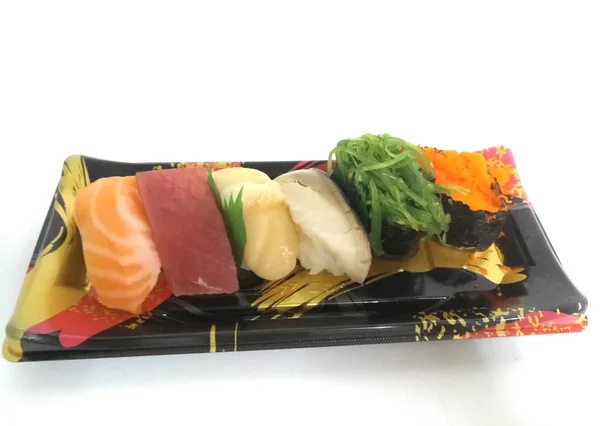 Különböző sushi lemez fehér háttér — Stock Fotó