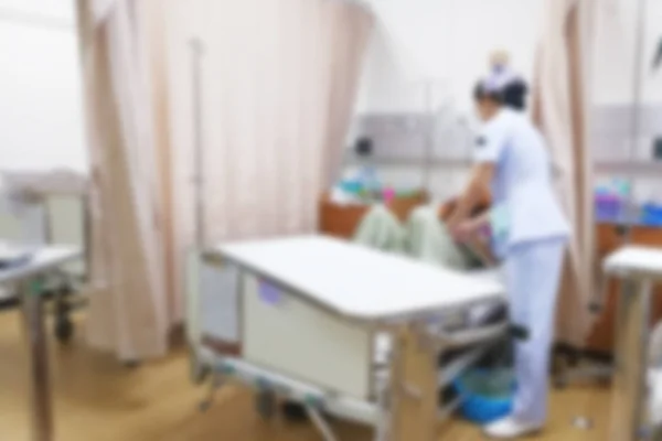 Wazig verpleegkundige en patiënt — Stockfoto