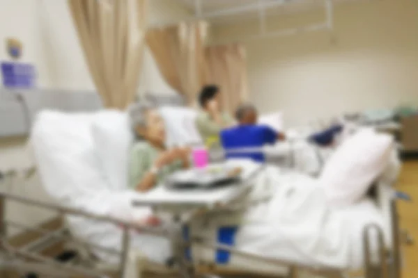 Verschwommene Krankenschwester und Patientin — Stockfoto