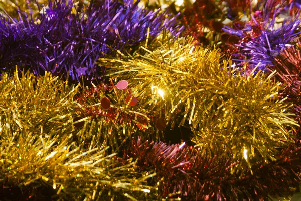 Χριστουγεννιάτικο Φόντο Φωτεινό Λαμπερό Πολύχρωμο Tinsel — Φωτογραφία Αρχείου