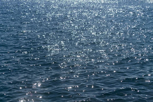 Rippled Blue Sea Water Glittering Sunlight Background — 스톡 사진