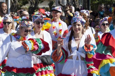 Limassol, Cyprus, March 1st, 2020: Group of people in bright carnival costumes taking part in the Grand Parade of the Annual Limassol Carnival Festival
