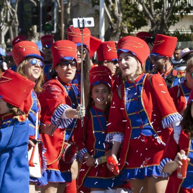 Limassol, Cyprus, March 1st, 2020: Group of people in bright carnival costumes taking selfie during the Grand Parade of the Annual Limassol Carnival Festival