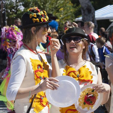Limassol, Cyprus, March 1st, 2020: Two young women in funny carnival costumes taking part in the Grand Parade of the Annual Limassol Carnival Festival