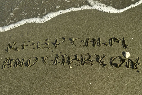 Words Keep Calm Carry Written Wet Sand Sea Beach Sunlight — Stock fotografie