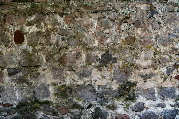 Muur van steen als textuur en achtergrond — Stockfoto