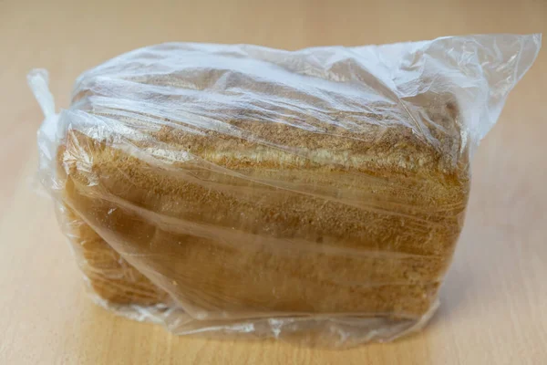 Fresh bread in a transparent bag — ストック写真