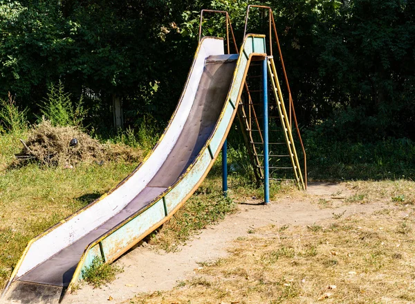 Children's slide in the playground — Stock Photo, Image