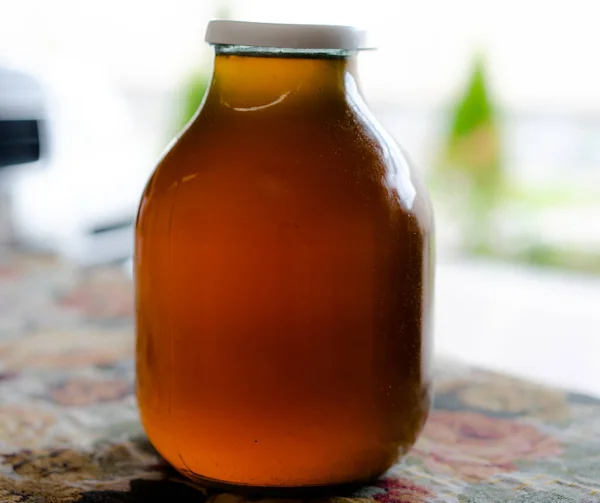 Jar of honey from the cellar — Stock Photo, Image