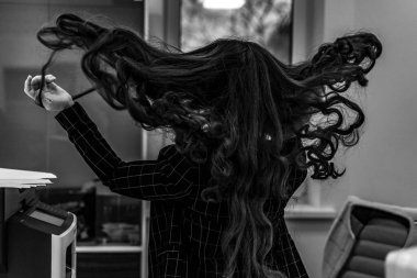 Girl dissolve her long hair clipart
