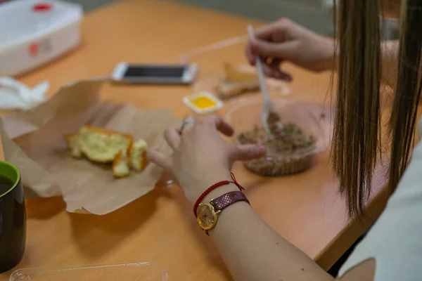 Girl having lunch at work